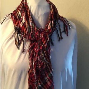 Fringed scarf.